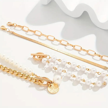 Chic Gold 4-Piece Bracelet Set – Snake, Pearls & Links | Golden
