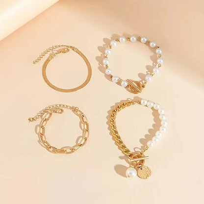 Chic Gold 4-Piece Bracelet Set – Snake, Pearls & Links | Golden
